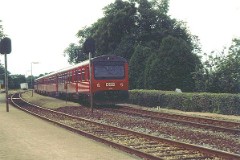 DSB MR class photographed in Gadbjerg, Jutland, 2. August 1981.  The MR class was purchased from 1978 to 1985 in a number of 98. The first 30 was built by Uerdingen in Germany, the rest by Scandia in Denmark. Dieselhydraulic Deutz engine. 325 hp. Max speed 120 km/h - 75 mph. Length each unit 22 335 mm. Weight 34,5 metric tonnes. One trainset consists of two units. In 1995 - 1997 renovated and painted in a white/red colourscheme. Increased max. speed to 130 km/h - 81 mph.